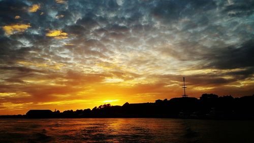 Scenic view of dramatic sky during sunset