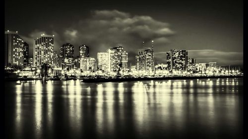 Illuminated cityscape at night