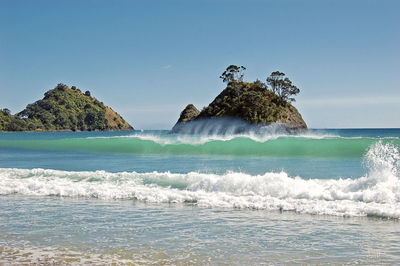 Panoramic view of sea against clear sky