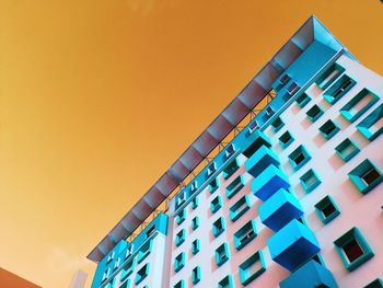 Low angle view of modern building against clear sky