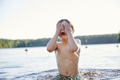 Boy playing in water