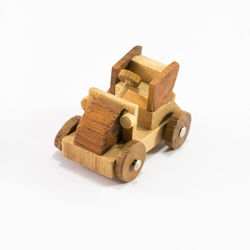 Wooden cart against white background