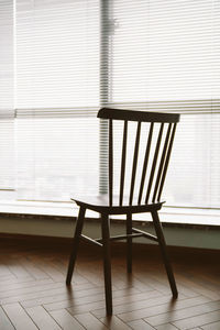 Table and chairs on hardwood floor at home