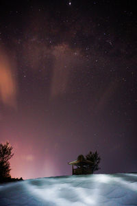 Scenic view of star field against sky at night