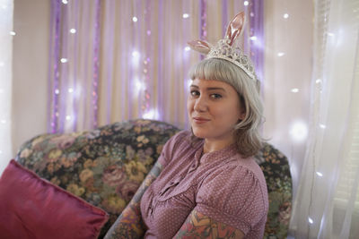 Young woman sitting on a couch