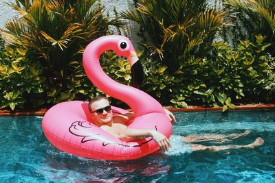 Close-up of young man in swimming pool