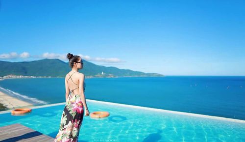 Scenic view of sea against blue sky
