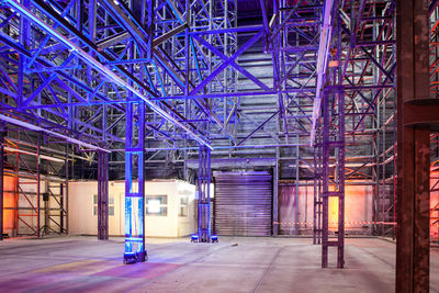 Interior of illuminated modern building at night