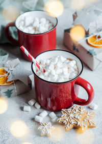 Cozy winter and christmas setting with hot cocoa and homemade cookies