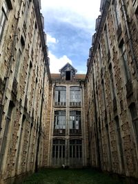 Low angle view of buildings against sky