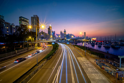 High angle view of light trails on city street at night