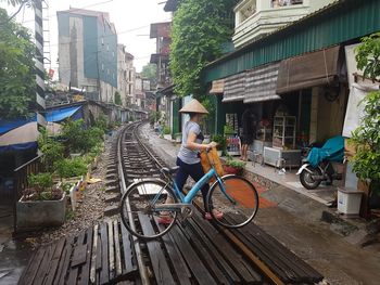 People riding bicycle on street