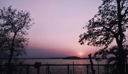 Scenic view of sea against sky at sunset