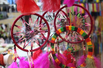 Close-up of colorful dreamcatchers hanging at market stall