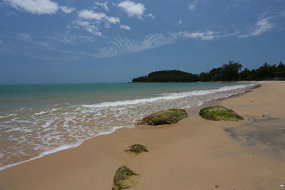 Scenic view of beach against sky