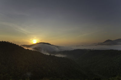 Scenic view of mountains against sky during sunset