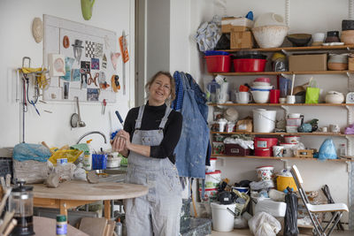 Woman in pottery workshop