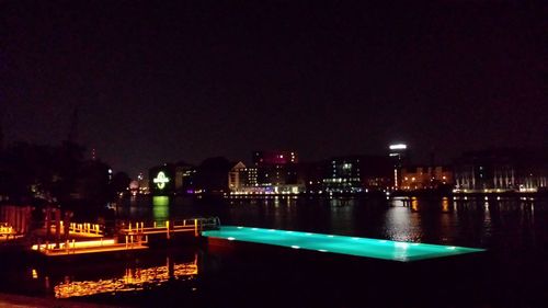 Illuminated cityscape at night