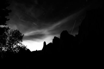 Low angle view of built structure against sky at night