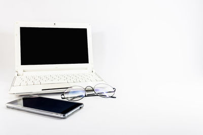 Directly above view of smart phone on table