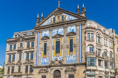 Low angle view of cathedral against clear blue sky