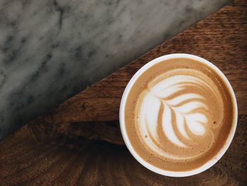 High angle view of cappuccino on table