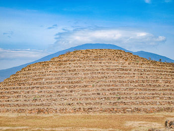 View of ruins of mountain against sky