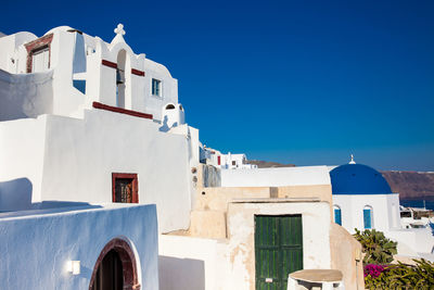 Traditional architecture of the churches of the oia city in santorini island