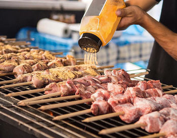 Close-up of meat on barbecue grill