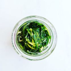 Directly above shot of glass jar on white background