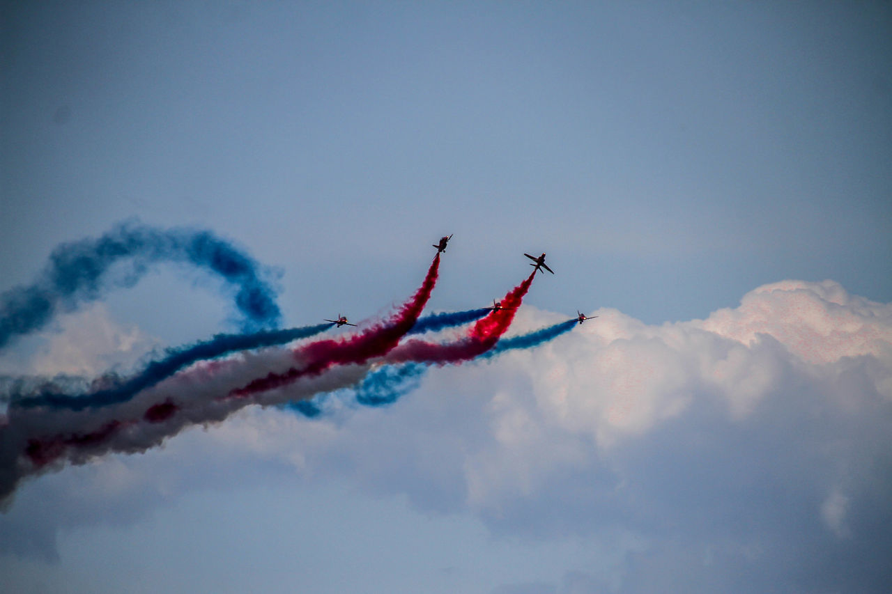 LOW ANGLE VIEW OF AIRSHOW IN SKY