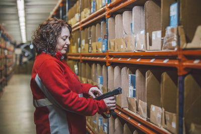 Side view of a woman working