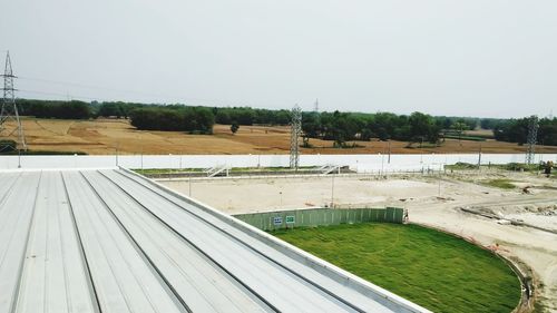 High angle view of dam on field against clear sky