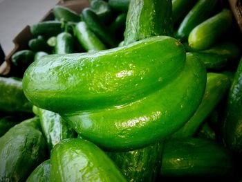 Close-up of green chili peppers in market