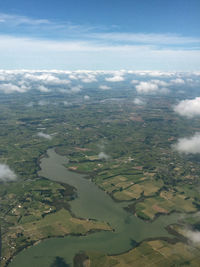 Aerial view of agricultural landscape against sky