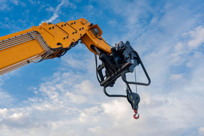 Low angle view of construction site against sky