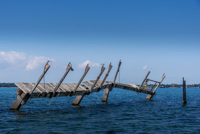 Broken pier in the sea