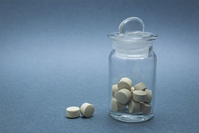 Close-up of drink in glass jar on table