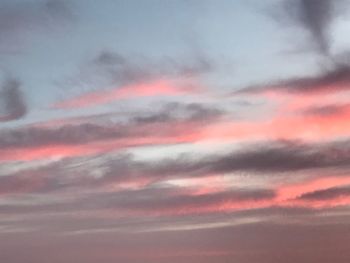 Low angle view of dramatic sky during sunset