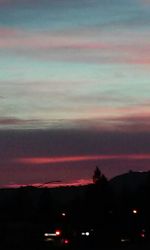 Scenic view of landscape against cloudy sky