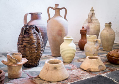 Group of objects on wood against wall