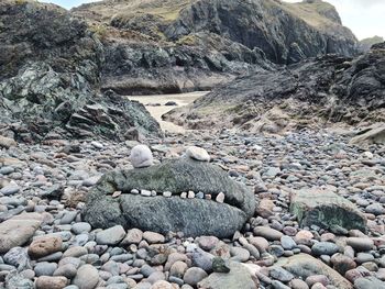 View of stones in shallow water