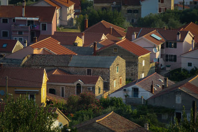 High angle view of houses and buildings in city