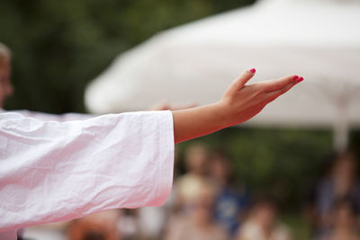 Cropped image of woman practicing karate