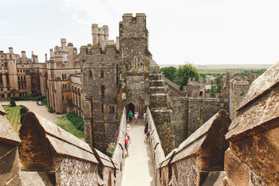 High angle view of walkway leading to built structure