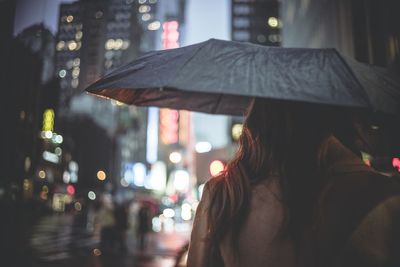 Woman standing in city