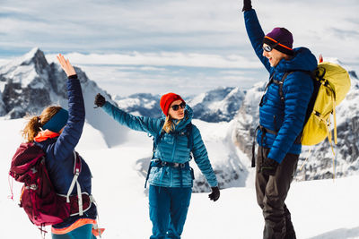 Full length of woman standing on snow