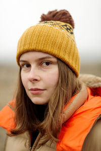 Portrait of young woman outdoors