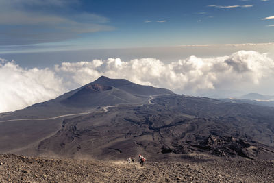 Scenic view of volcanic mountain against sky