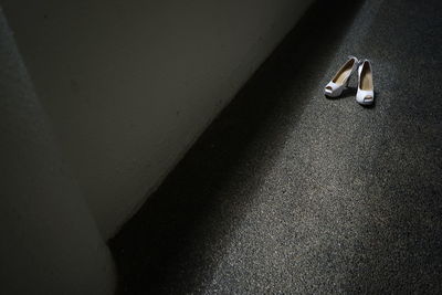 High angle view of shoes on wall